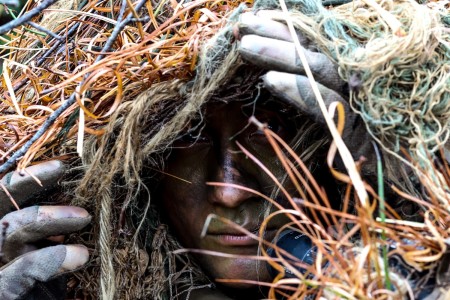 Soldiers from Sniper School Class 23-002 participate in stalk training January 02, 2023 at Fort Benning, Georgia. Stalking training, a type of exercise in which snipers stealthily approach a target, set up a forward firing position and put two shots on the target without exposing themselves, is one way snipers master concealment techniques. Trained observers at the target hunt for them. 