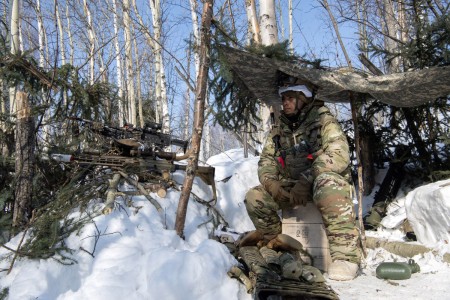 U.S. Army Spc. Kyle Tango, an infantryman with Baker Company, 3rd Battalion, 509th Parachute Infantry Regiment, 2nd Infantry Brigade Combat Team (Airborne), 11th Airborne Division, mans a fighting position during night operations for Joint Pacific Multinational Readiness Center-Alaska 23-02 at Yukon Training Area, Alaska, April 3, 2023. JPMRC-AK 23-02 is a display of the 11th Airborne Division’s ability to survive and thrive in the Arctic, and its soldiers’ ability to fight and win our nation’s wars anywhere.